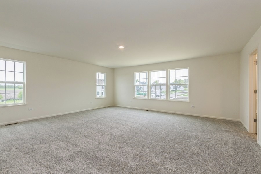 3616 Edelweiss Road Elgin, IL 60124 - Photo 13 of 26 an empty room with windows