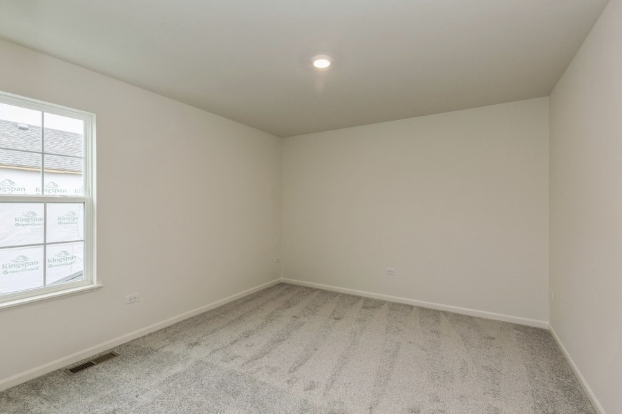 3616 Edelweiss Road Elgin, IL 60124 - Photo 17 of 26 an empty room with windows