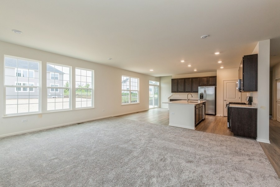 3616 Edelweiss Road Elgin, IL 60124 - Photo 6 of 26 a view of a kitchen with a sink and cabinets