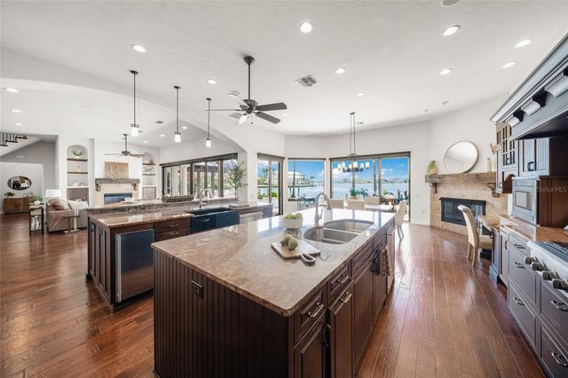a living room with furniture window and wooden floor