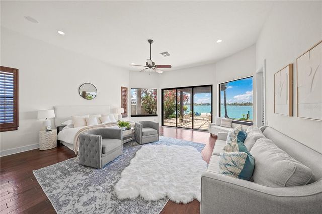 a view of a house with outdoor space and lake view