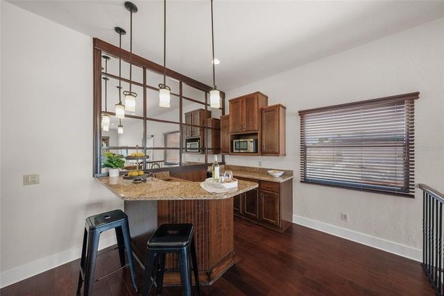 a large bedroom with a large bed and a couch