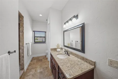 a view of a backyard and a lake view