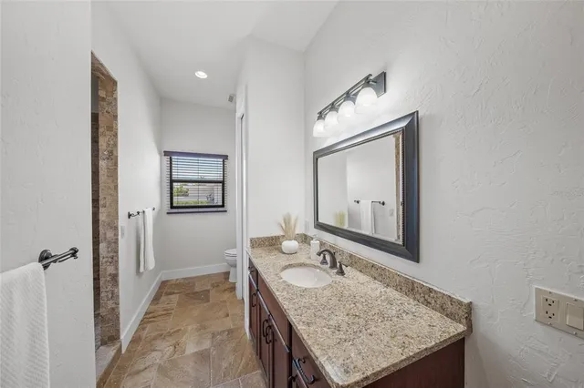 a view of a backyard and a lake view