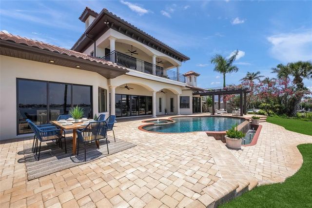 an aerial view of houses with yard