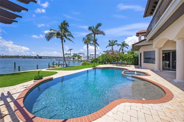 an aerial view of a house with a garden space