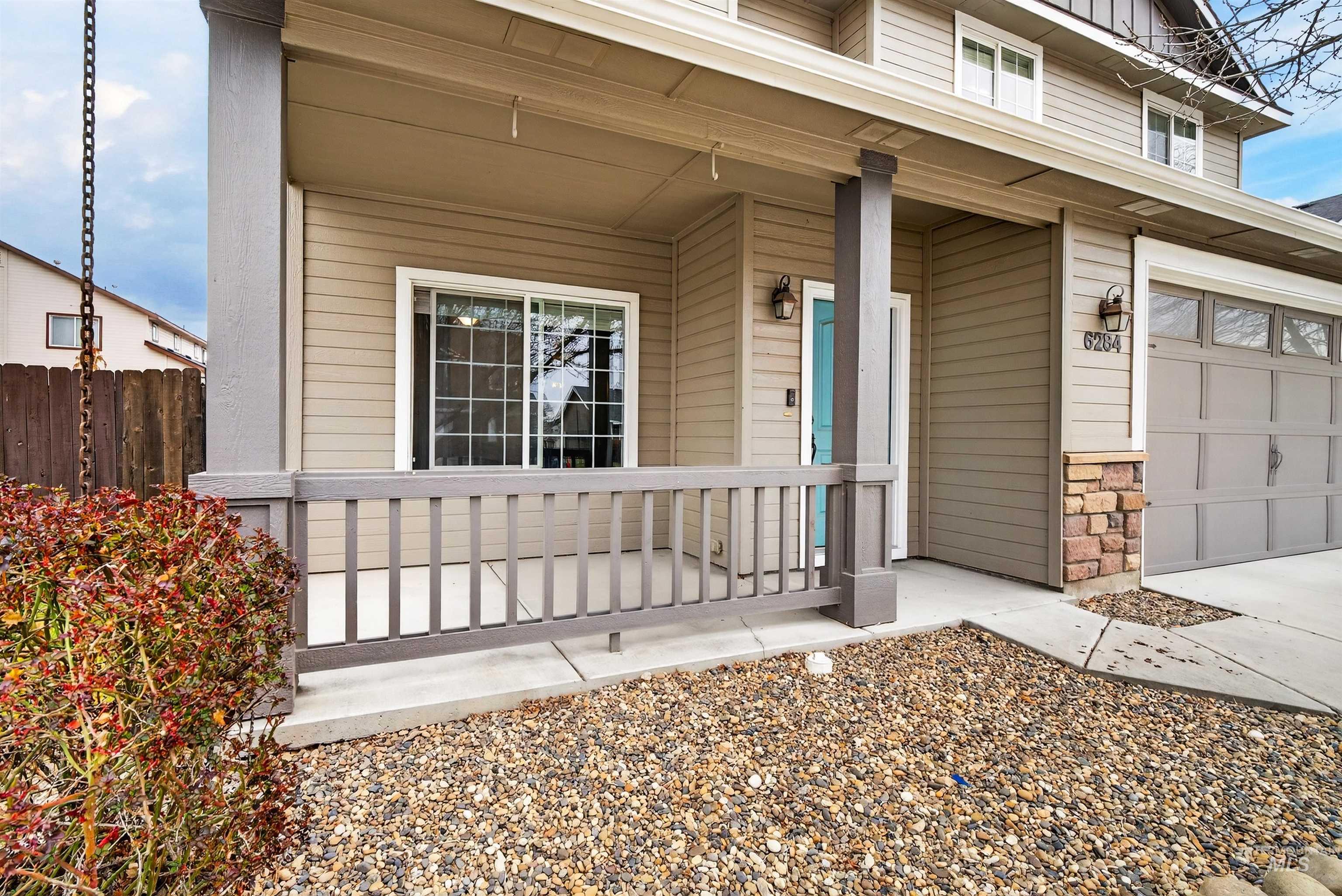 6284 North Silver Elm Way Meridian, ID 83646 - Photo 4 of 50 Property entrance with covered porch and stone siding
