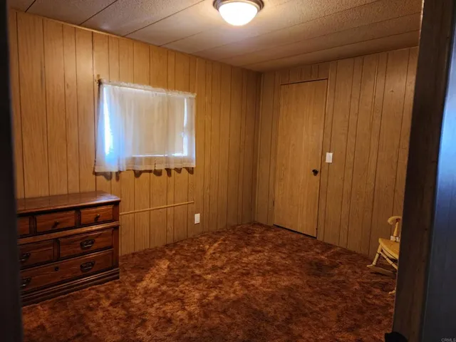 a view of room with window and bathroom