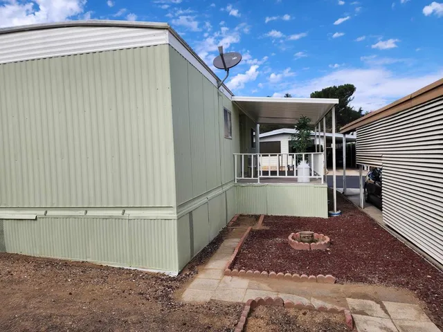 a view of a backyard of a house