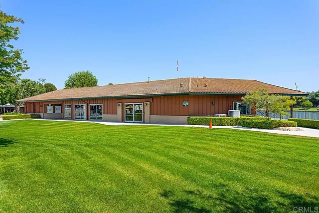a view of a swimming pool with a lounge chairs