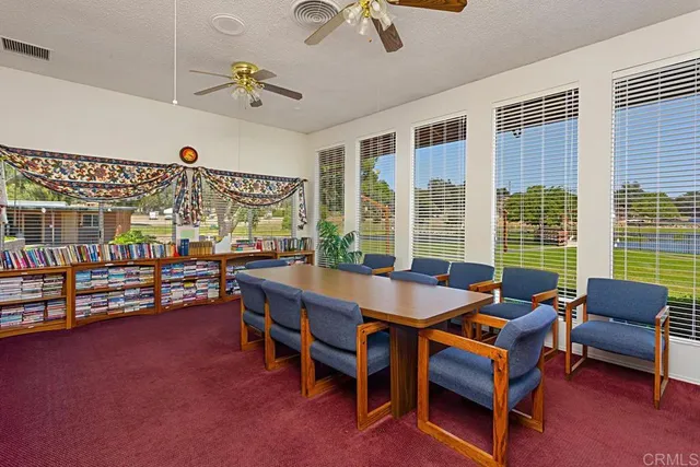 a room with furniture and a book shelf