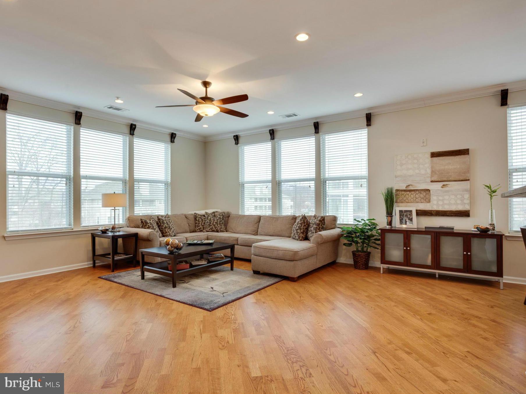 12000 Market Street, Unit 259 Reston, VA 20190 - Photo 3 of 30 Living Room - Bright and Sunny Corner Unit