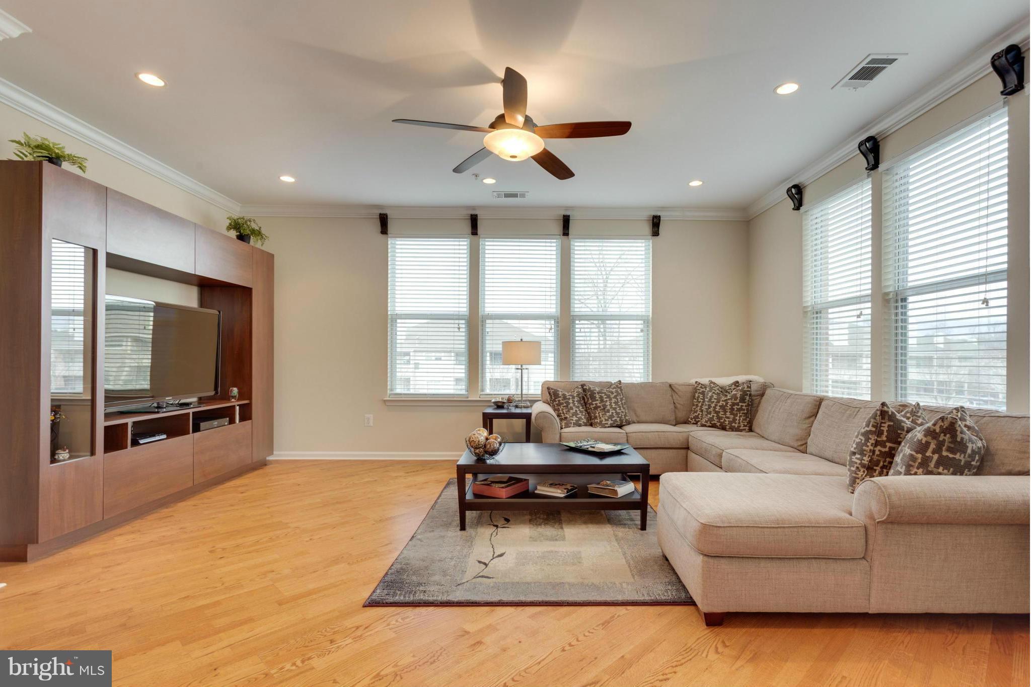 12000 Market Street, Unit 259 Reston, VA 20190 - Photo 4 of 30 LR-Crown Molding, Wood Floors, Recessed Lgts