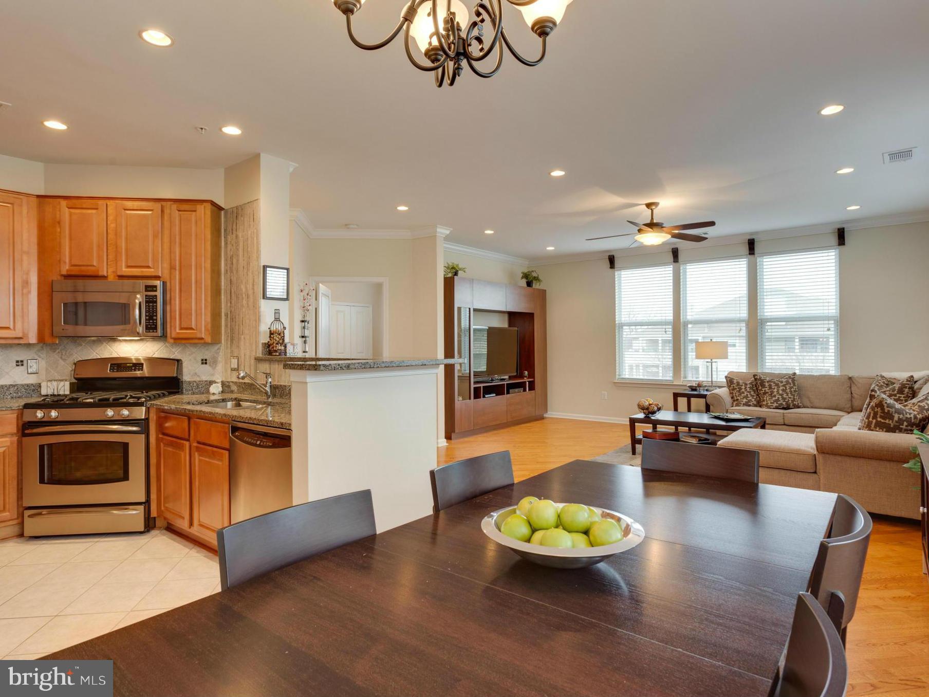 12000 Market Street, Unit 259 Reston, VA 20190 - Photo 7 of 30 Dining Area Open to Kitchen and Living Room