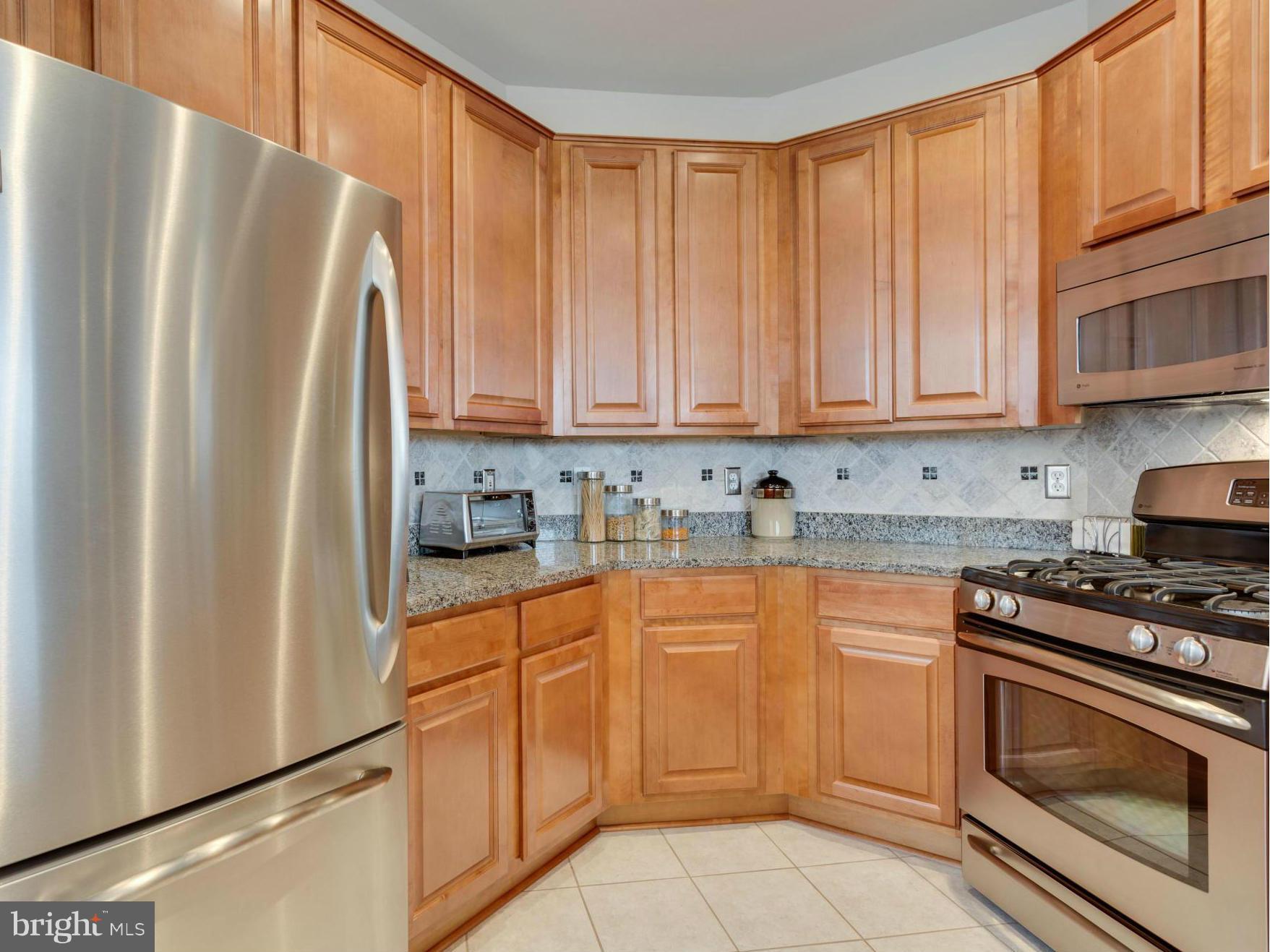 12000 Market Street, Unit 259 Reston, VA 20190 - Photo 10 of 30 Kitchen GE PROFILE Stainless Steel Appliances