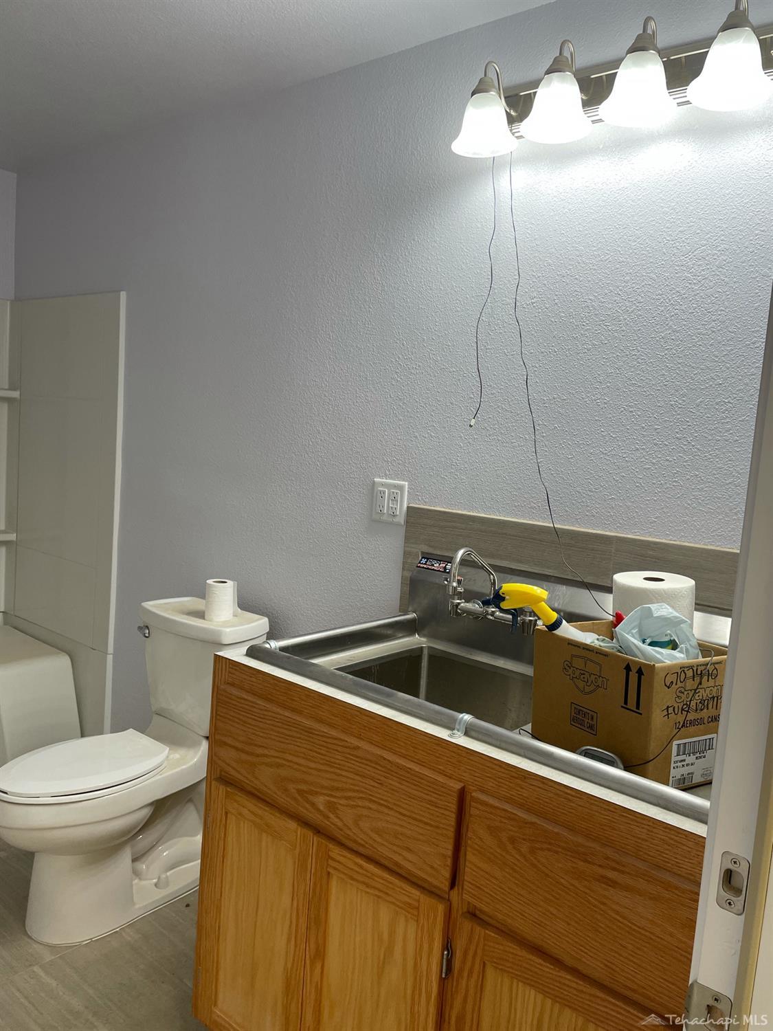 24401 Roper Street Tehachapi, CA 93561 - Photo 9 of 40 bathroom in shop