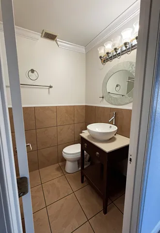 a bathroom with a sink and a toilet