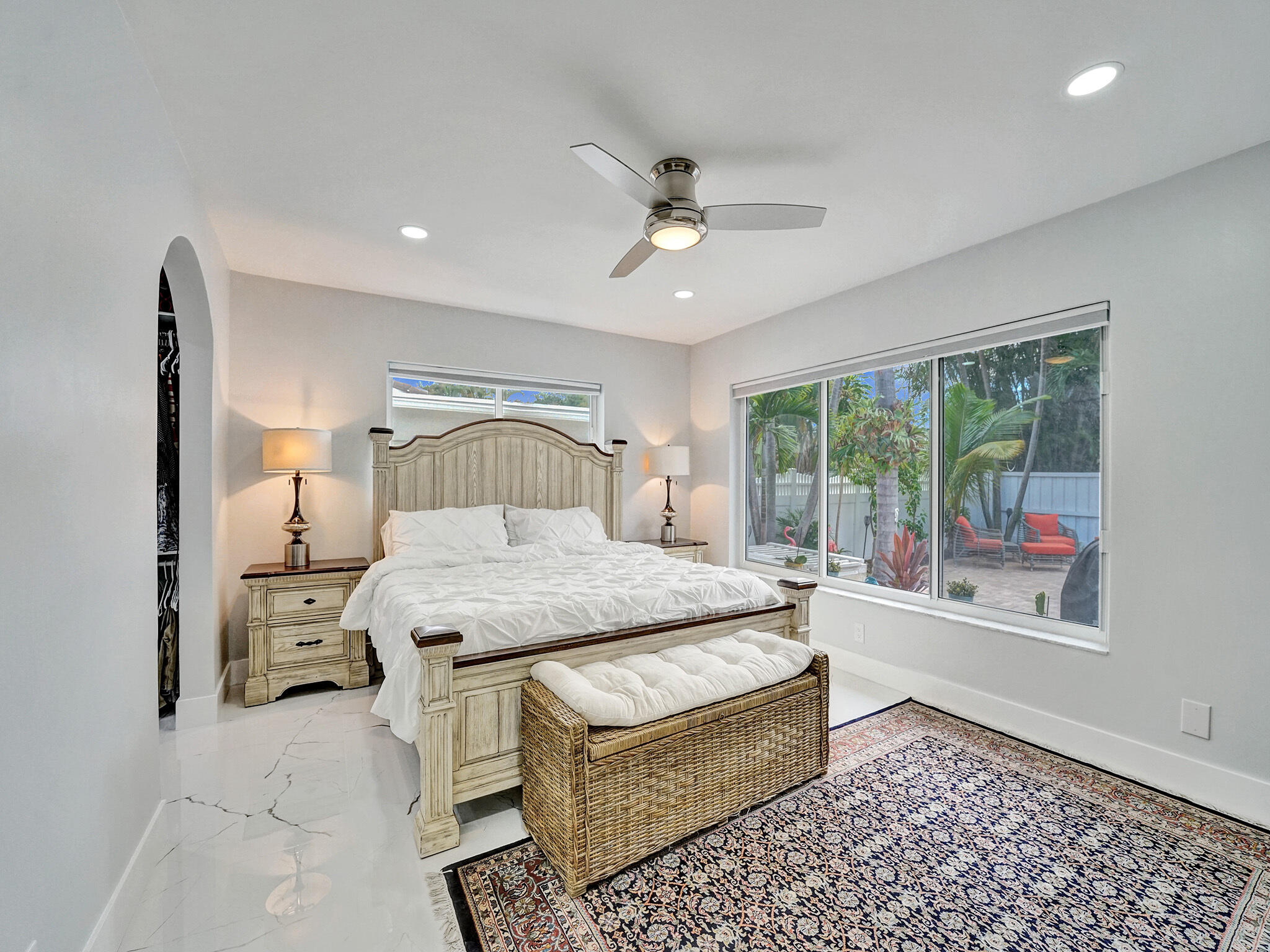 3204 Robbins Road Pompano Beach, FL 33062 - Photo 20 of 37 a bedroom with a bed wooden floor and window