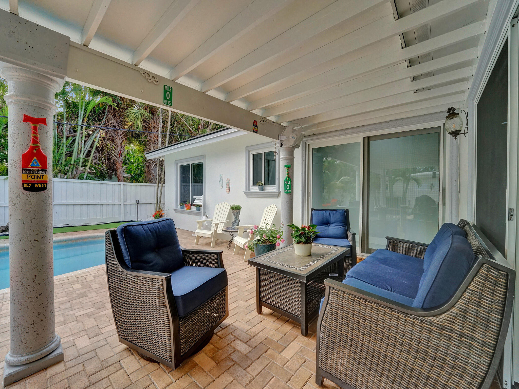 3204 Robbins Road Pompano Beach, FL 33062 - Photo 27 of 37 a outdoor living space with furniture and a potted plant