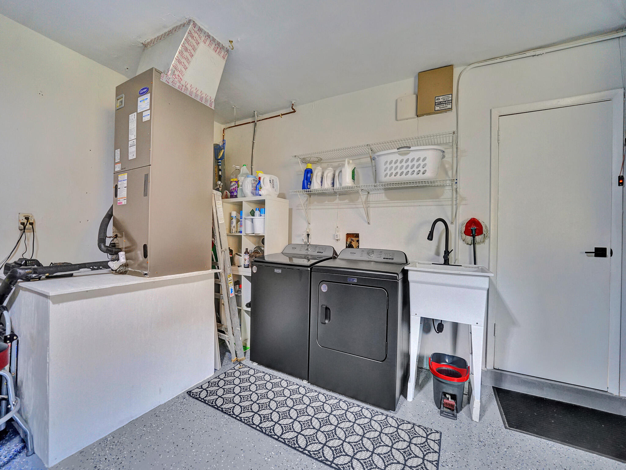 3204 Robbins Road Pompano Beach, FL 33062 - Photo 30 of 37 a room with storage and utility