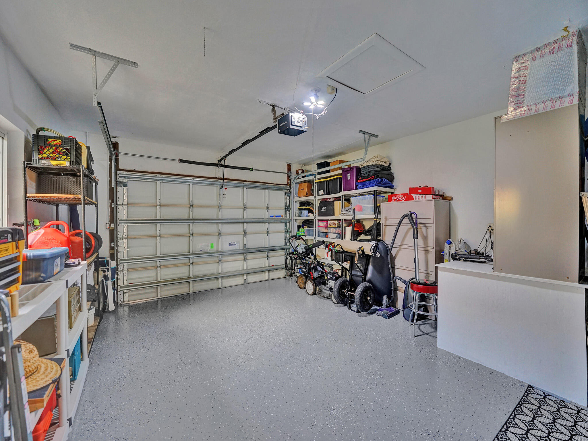 3204 Robbins Road Pompano Beach, FL 33062 - Photo 31 of 37 a view of a garage with rack and bicycle