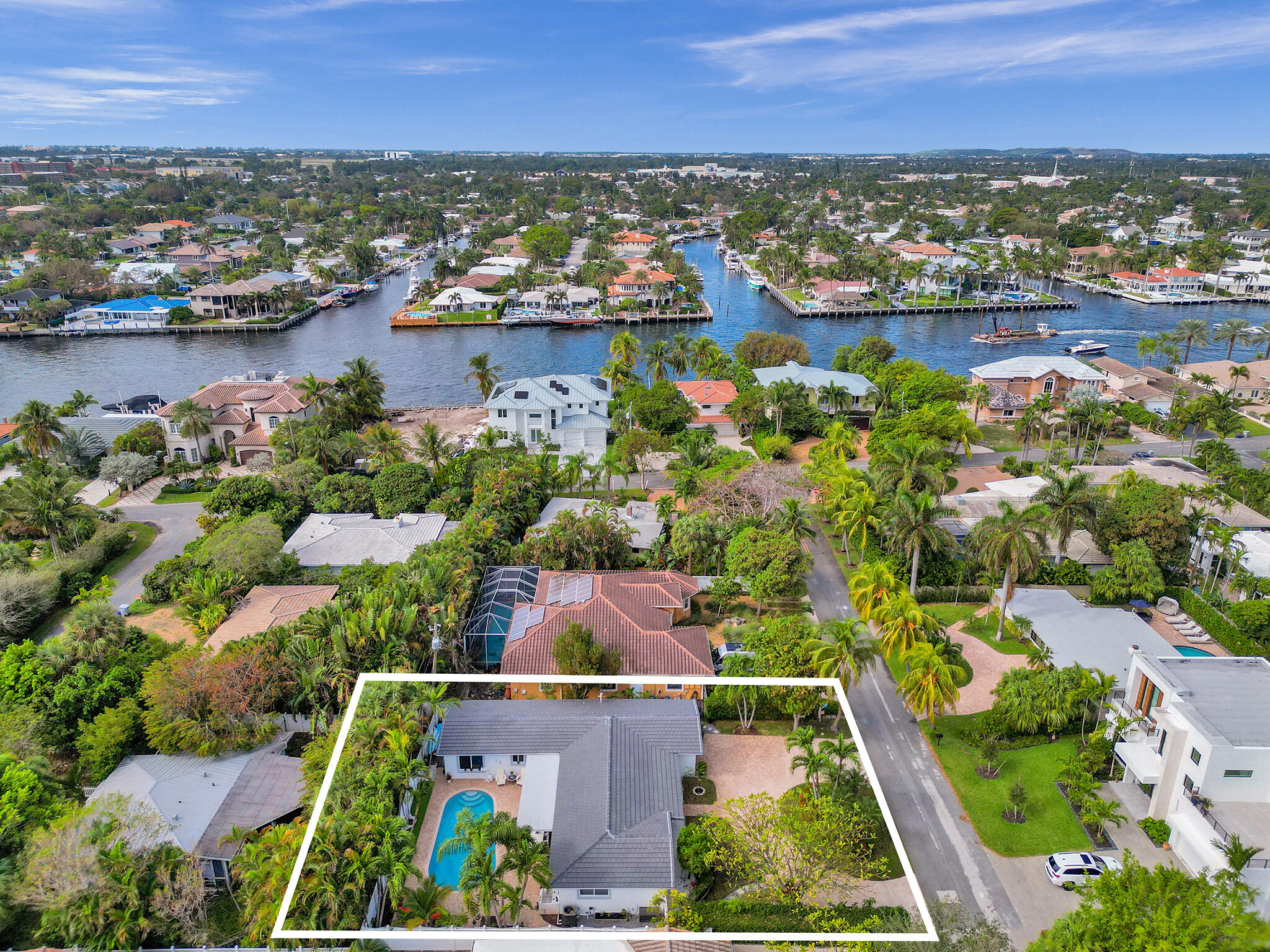 3204 Robbins Road Pompano Beach, FL 33062 - Photo 4 of 37 an aerial view of lake and city