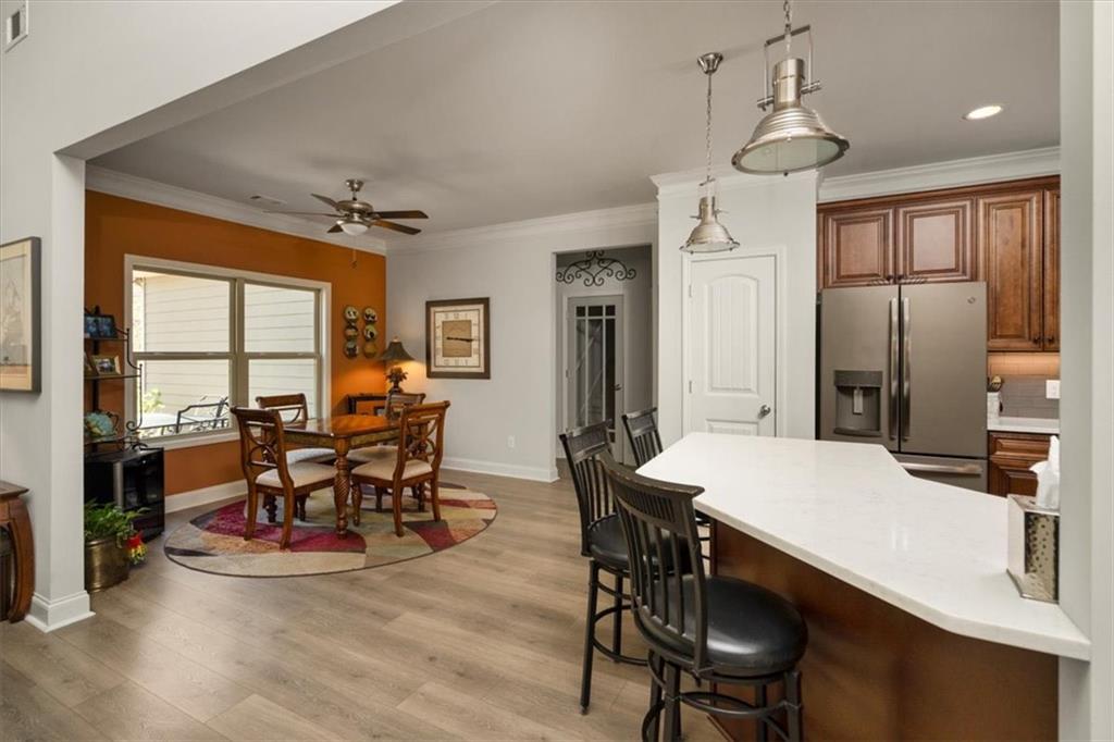 3065 Brooks Trail Monroe, GA 30656 - Photo 11 of 80 a view of a dining room with furniture window and wooden floor