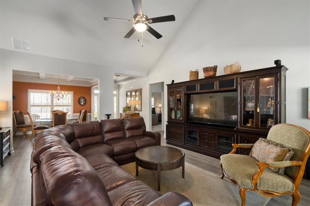 3065 Brooks Trail Monroe, GA 30656 - Photo 15 of 80 a living room with furniture and a flat screen tv