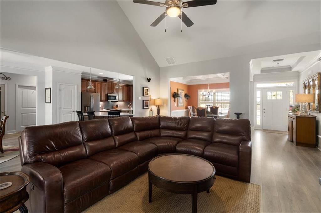 3065 Brooks Trail Monroe, GA 30656 - Photo 16 of 80 a living room with furniture and a wooden floor