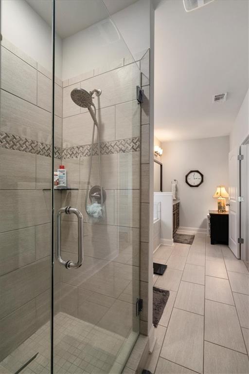 3065 Brooks Trail Monroe, GA 30656 - Photo 24 of 80 a bathroom with a shower and a toilet