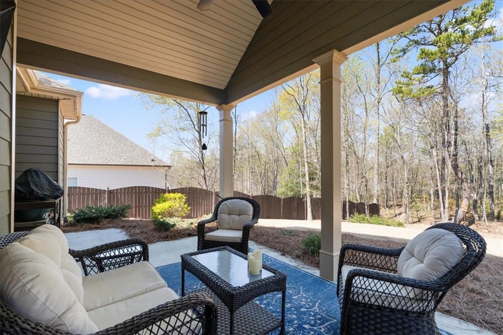 3065 Brooks Trail Monroe, GA 30656 - Photo 37 of 80 a living room with furniture and a large window