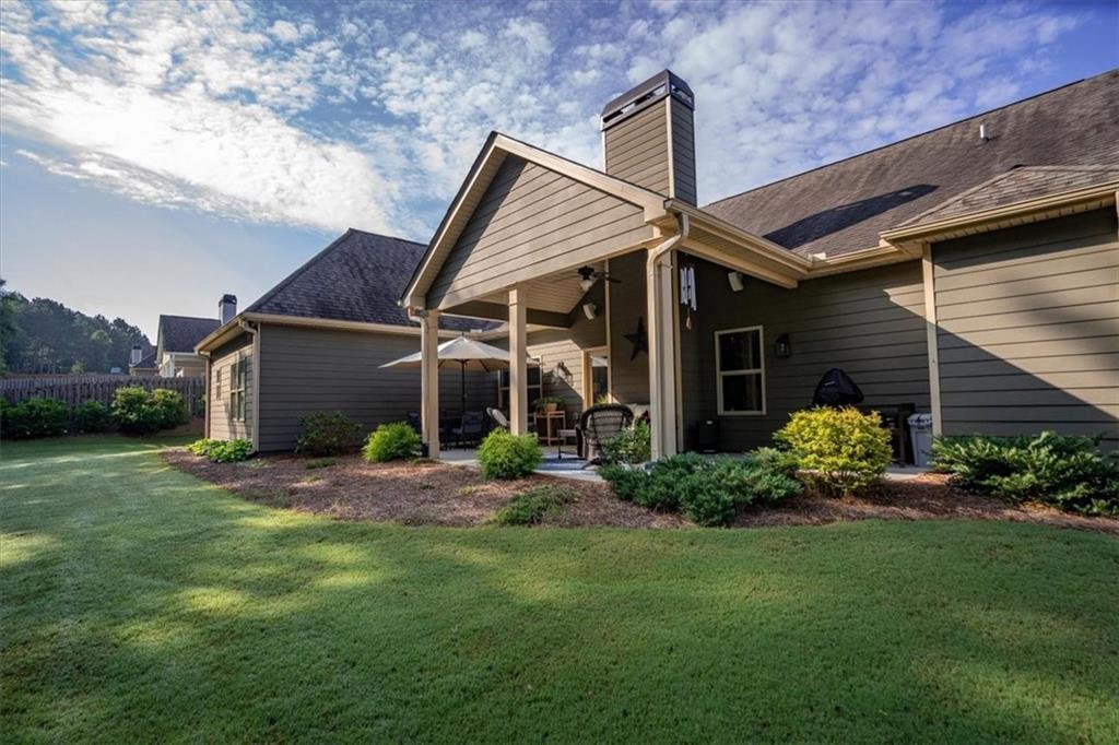 3065 Brooks Trail Monroe, GA 30656 - Photo 47 of 80 a front view of a house with garden