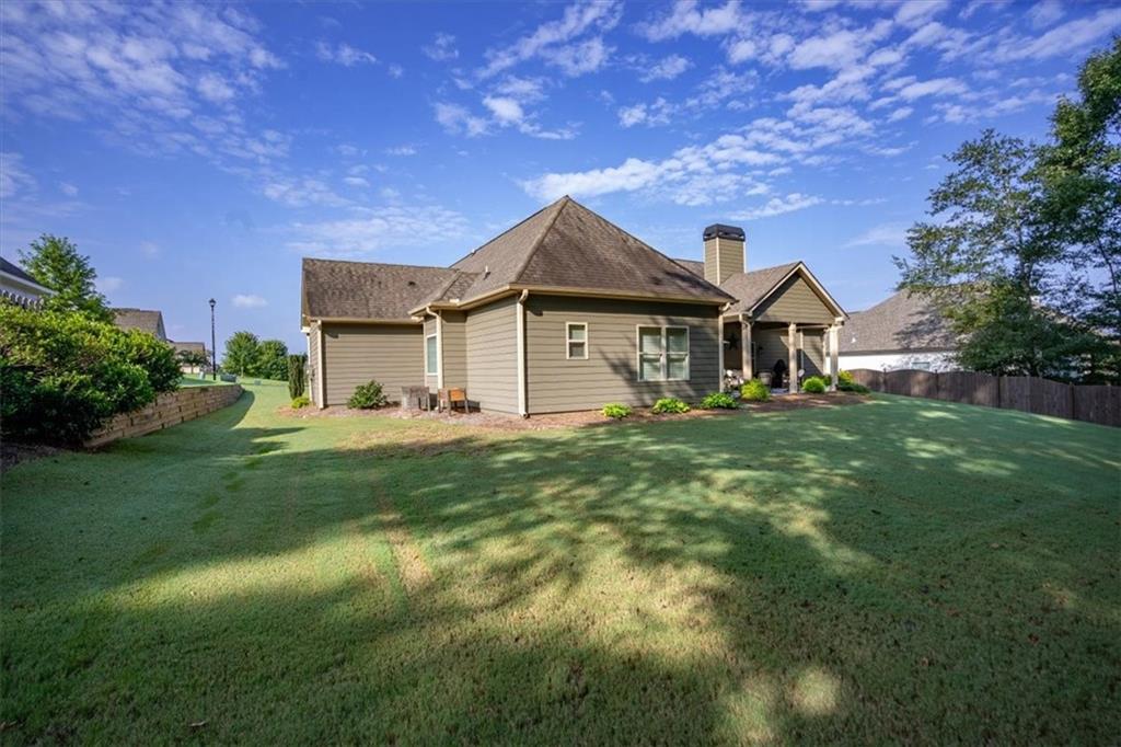 3065 Brooks Trail Monroe, GA 30656 - Photo 49 of 80 a front view of a house with a garden