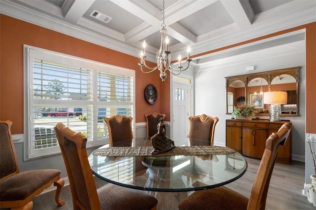 3065 Brooks Trail Monroe, GA 30656 - Photo 5 of 80 a dining room with furniture a chandelier and window