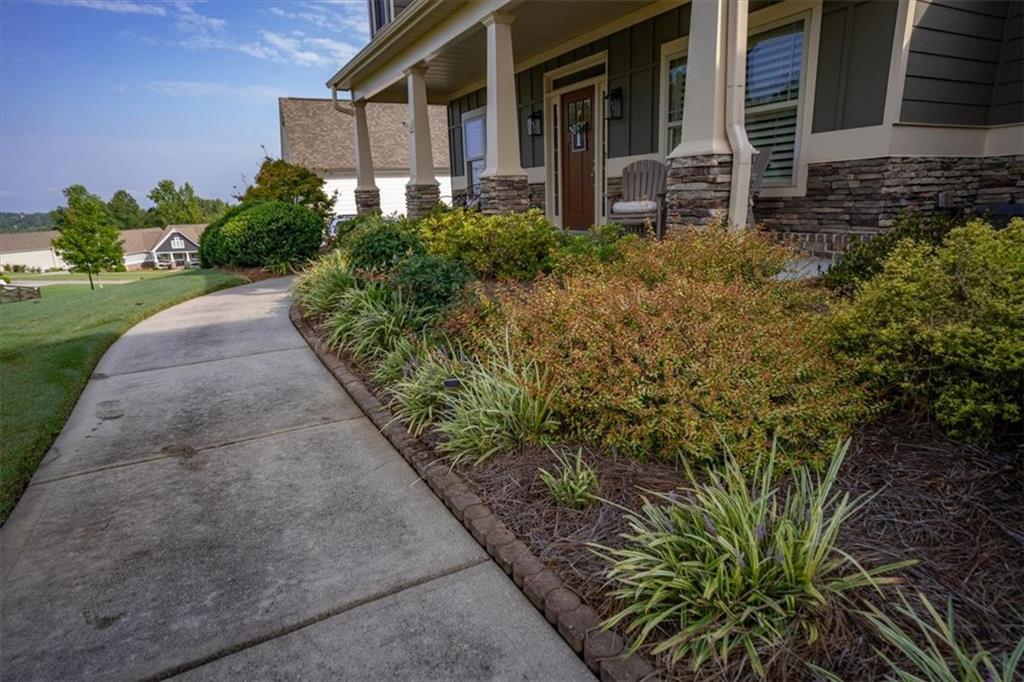 3065 Brooks Trail Monroe, GA 30656 - Photo 55 of 80 a front view of a house with garden