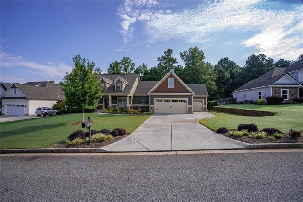 3065 Brooks Trail Monroe, GA 30656 - Photo 60 of 80 a front view of a house with a yard