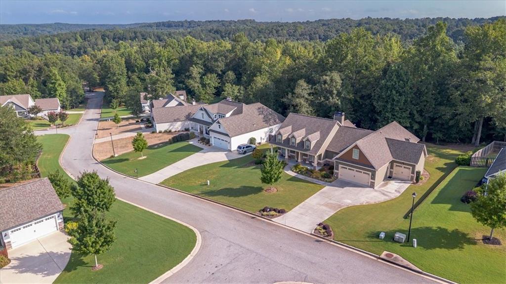 3065 Brooks Trail Monroe, GA 30656 - Photo 68 of 80 an aerial view of a swimming pool patio and mountain view