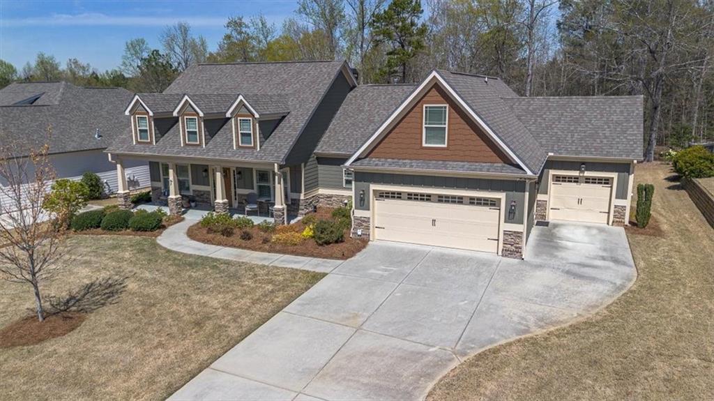 3065 Brooks Trail Monroe, GA 30656 - Photo 74 of 80 a front view of a house with garden