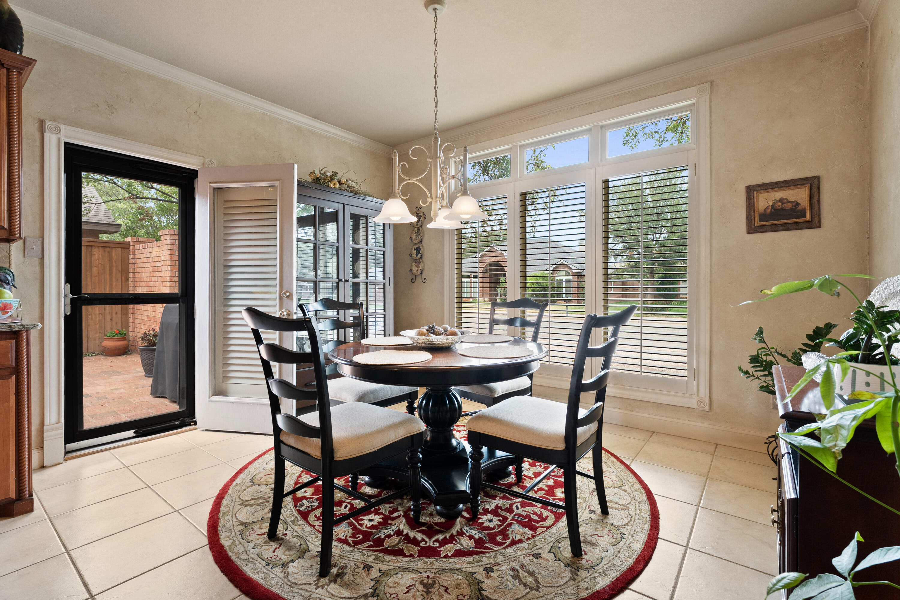 4813 101st Street Lubbock, TX 79424 - Photo 20 of 31 a view of a dining room with furniture and window