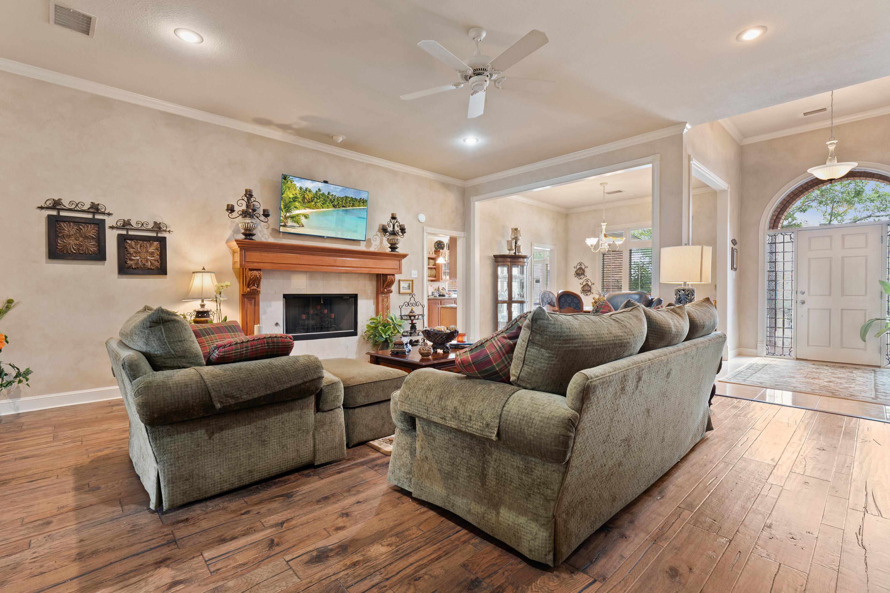 4813 101st Street Lubbock, TX 79424 - Photo 24 of 31 a living room with furniture and a fireplace