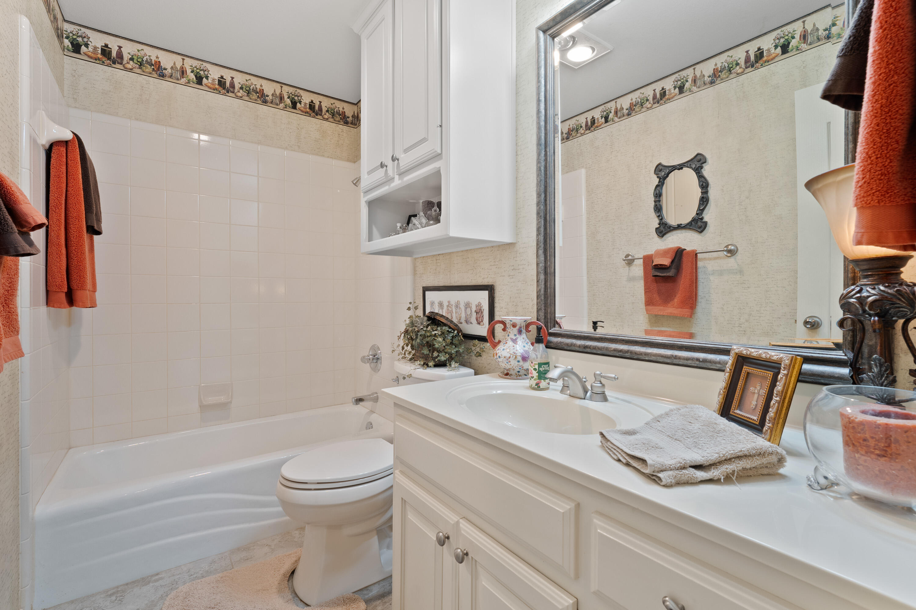 4813 101st Street Lubbock, TX 79424 - Photo 6 of 31 a bathroom with a granite countertop sink toilet and shower