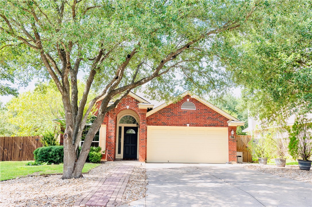 9428 Linkmeadow Drive Austin, TX 78748 - Photo 1 of 1 a front view of a house with a yard and garage