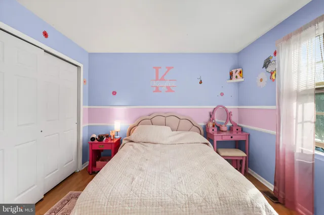 a bed room with a bed and a couch