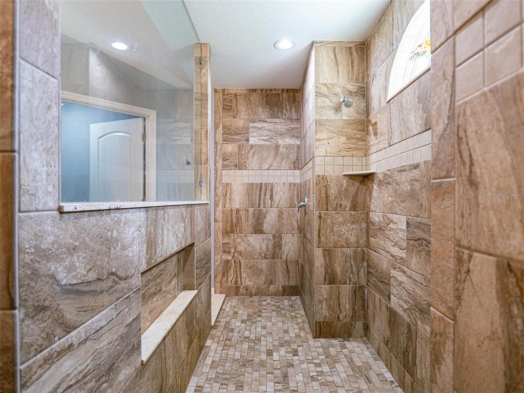 10688 Southwest 129th Terrace Road Dunnellon, FL 34432 - Photo 22 of 35 a bathroom with a shower