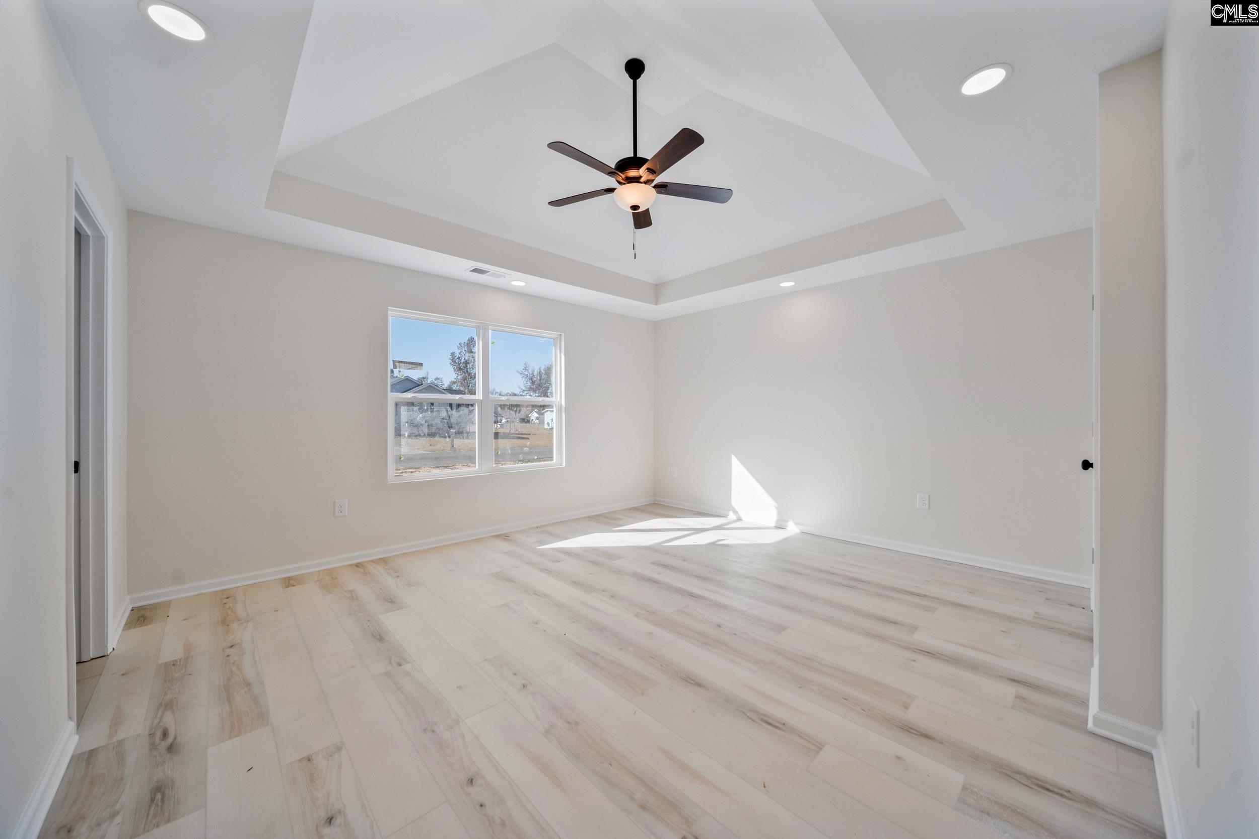 116 Sunny Acres Road Eastover, SC 29044 - Photo 20 of 40 a view of an empty room with a window