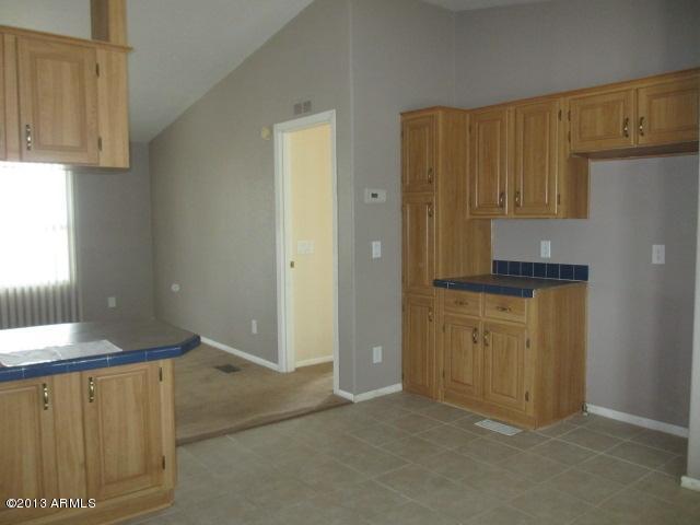 9660 North Ranchette Way Maricopa, AZ 85139 - Photo 8 of 39 023-254317-Kitchen to Living Room