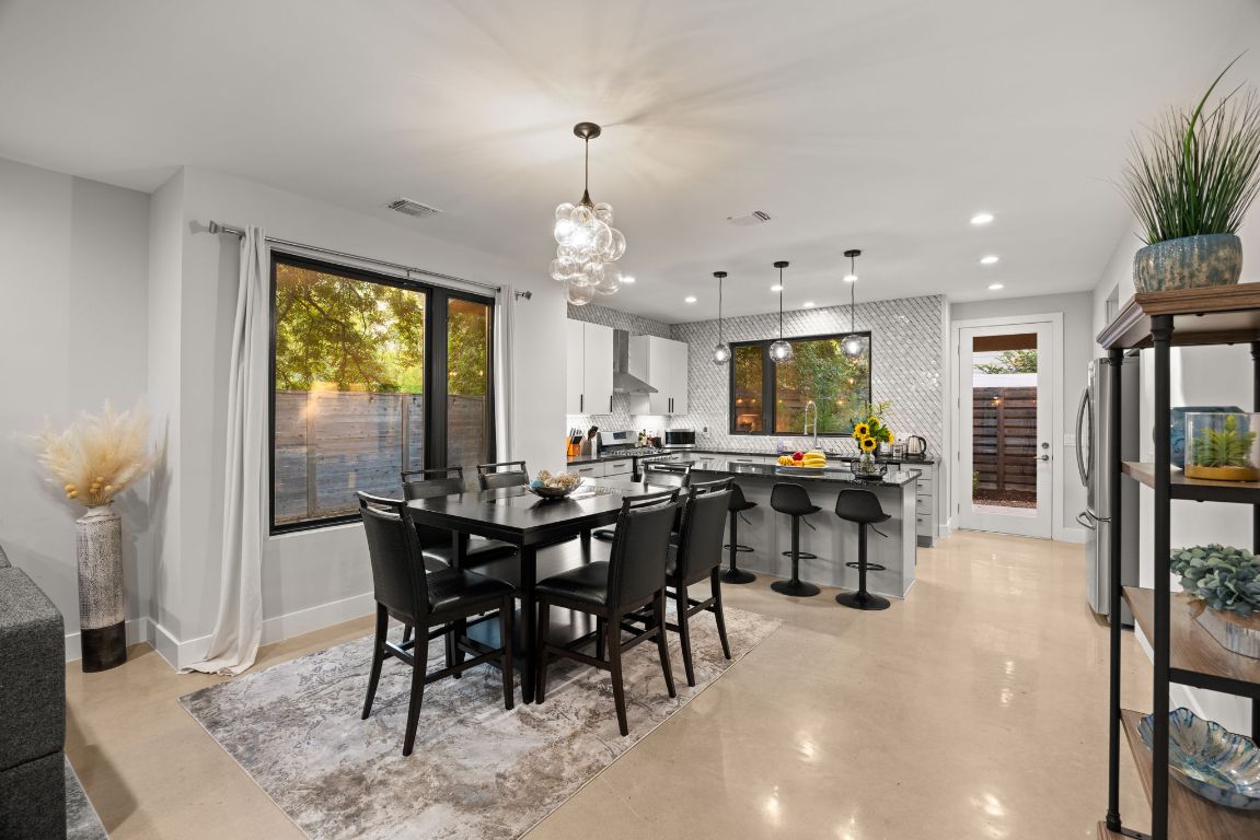 3610 Thompson Street, Unit 1 Austin, TX 78702 - Photo 14 of 39 a view of a dining room with furniture and window