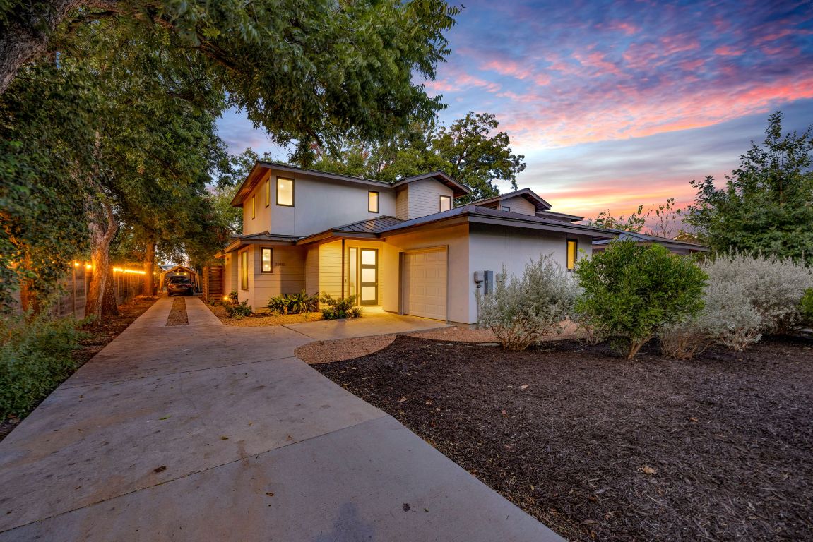 3610 Thompson Street, Unit 1 Austin, TX 78702 - Photo 3 of 39 a view of a house with a yard
