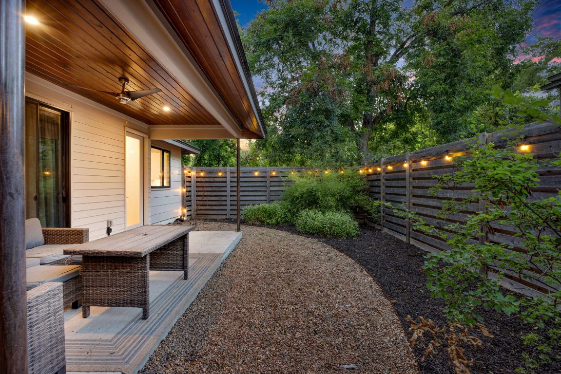 3610 Thompson Street, Unit 1 Austin, TX 78702 - Photo 37 of 39 a backyard of a house with outdoor seating
