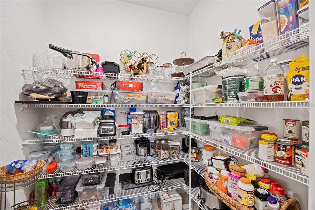 5513 Little Path Drive Wimauma, FL 33598 - Photo 12 of 40 a room with storage and utility